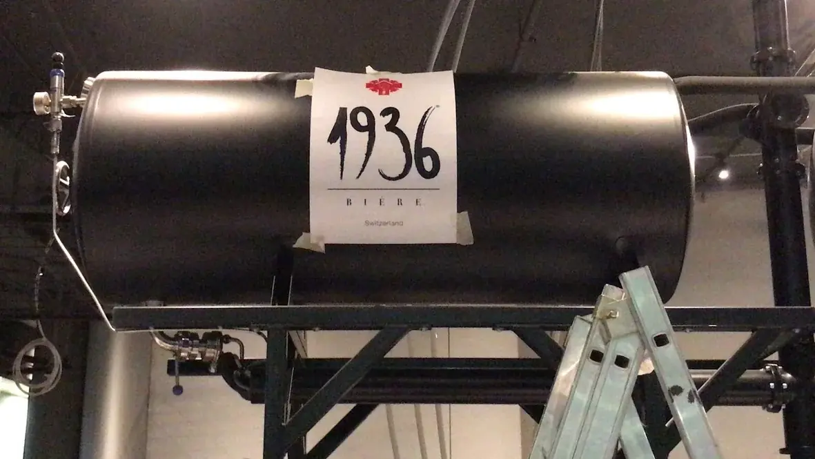 Two 1936 Bière branded tanks installed together above the venue interior, gallery image 24