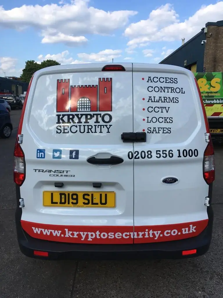 Krypto Security rear-door graphics with castle logo, service list and social media icons