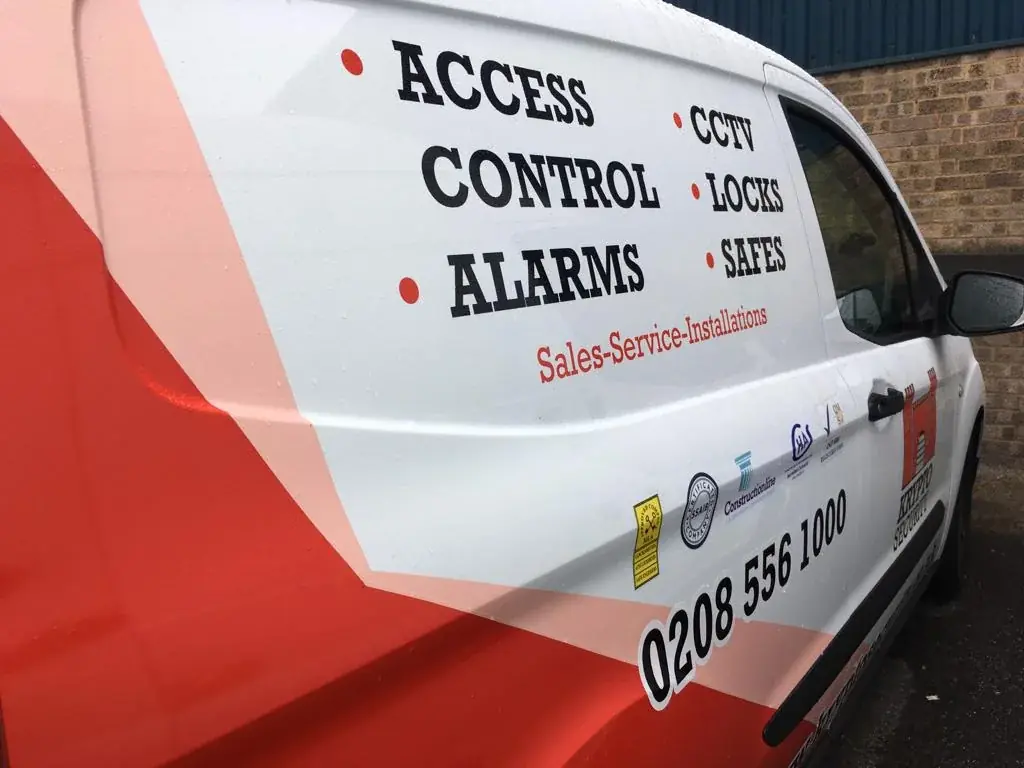 Close view of Krypto Security van side graphics listing access control, alarms, CCTV, locks and safes