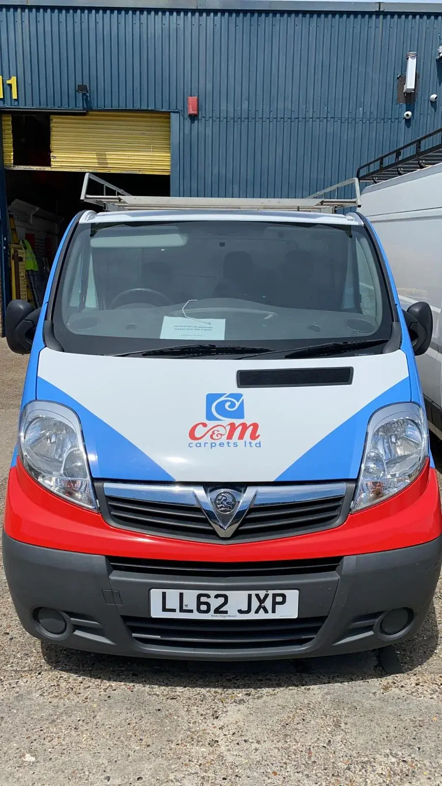 C&M Carpets bonnet graphics with centred logo and red and blue colour fields