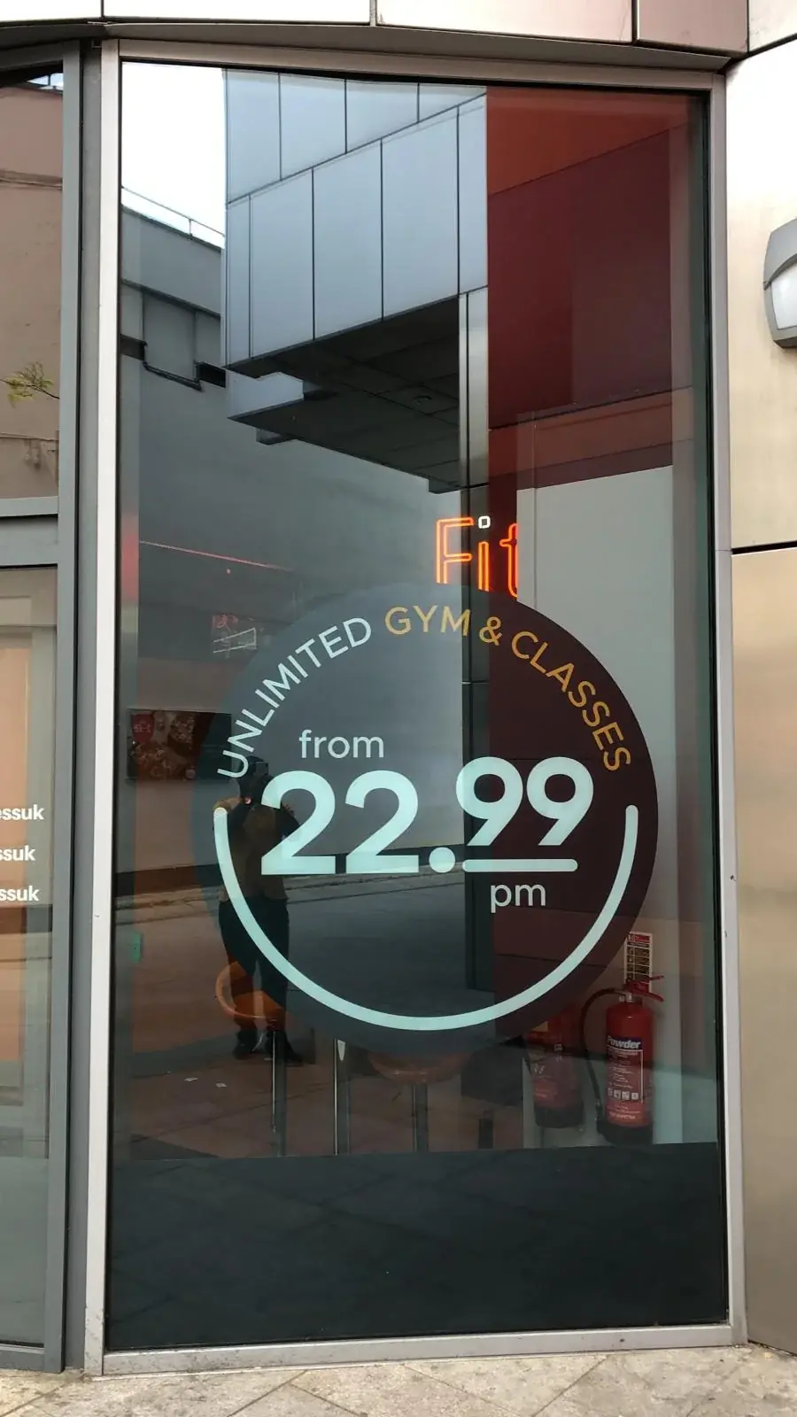 Fitness4Less 22.99 membership offer printed as a circular window sticker