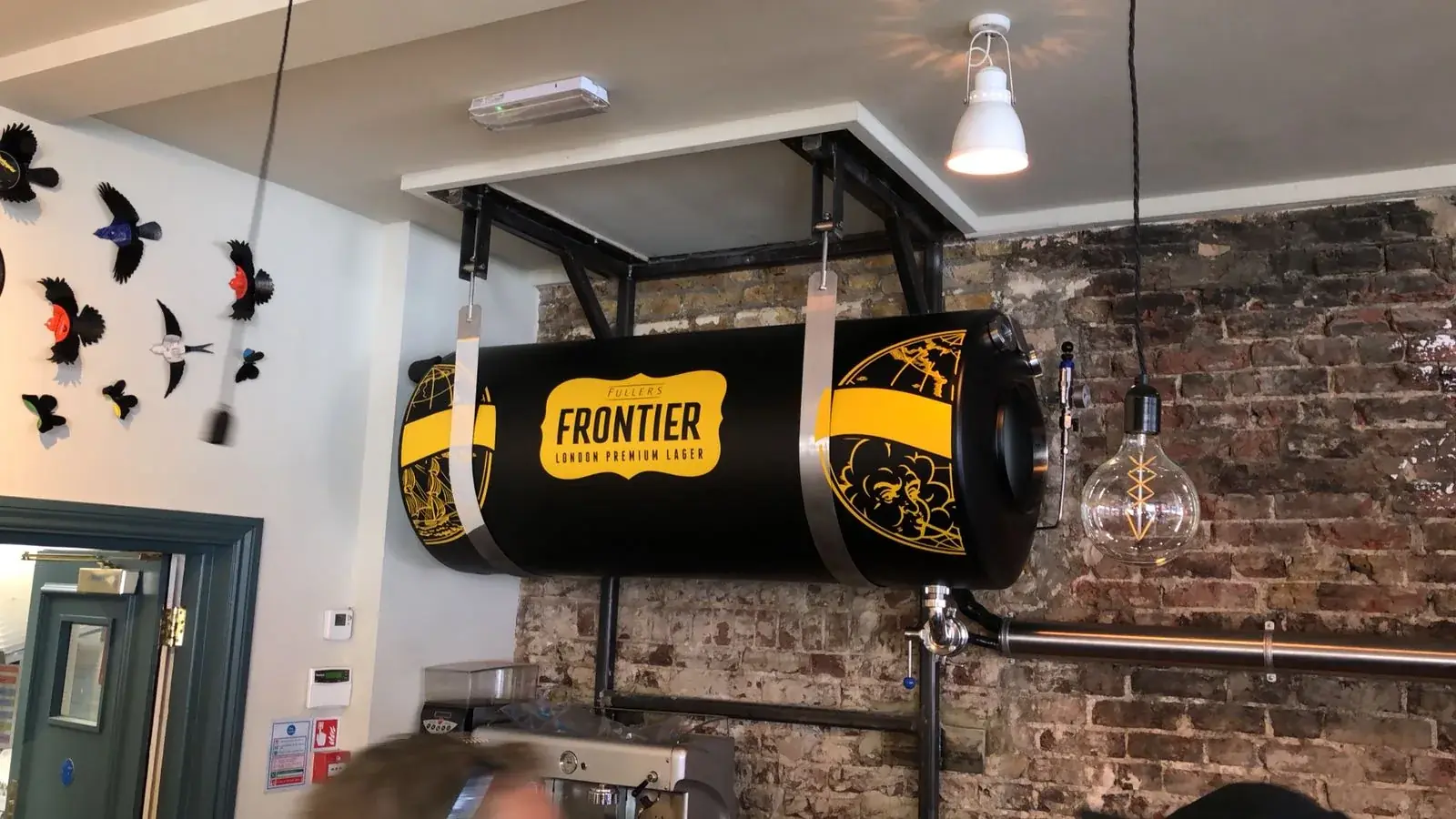 Completed full Frontier branded wrap fitted to a suspended beer tank, gallery image 13