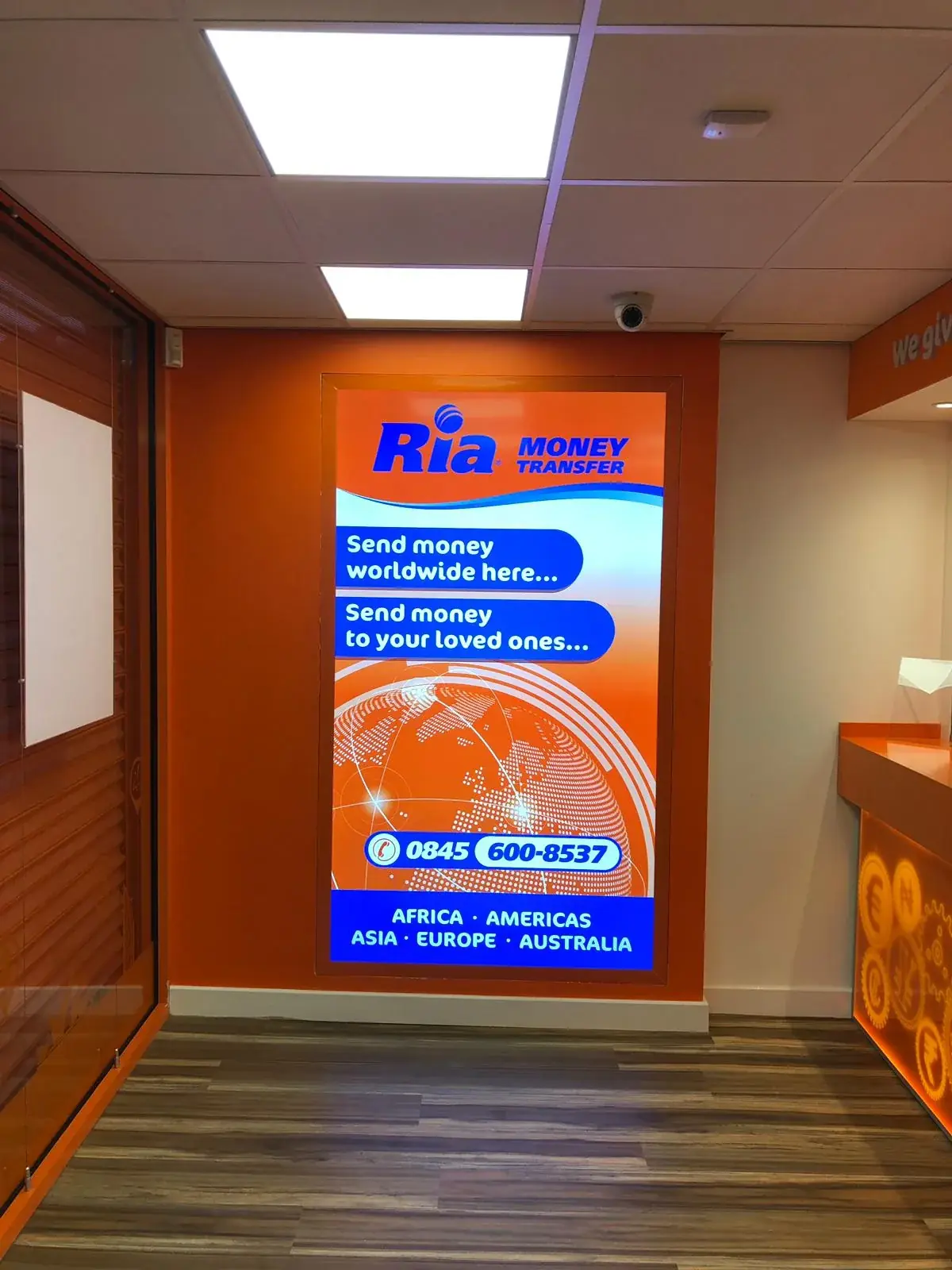 Digital Ria money-transfer information display inside the completed branch