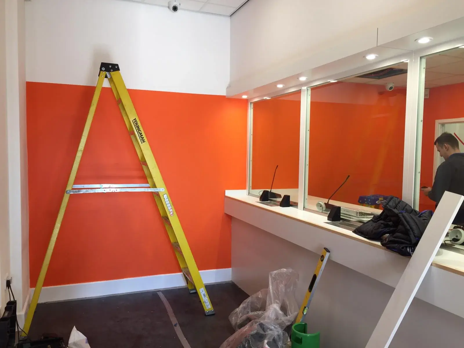 Ria interior graphics and customer counter installation in progress