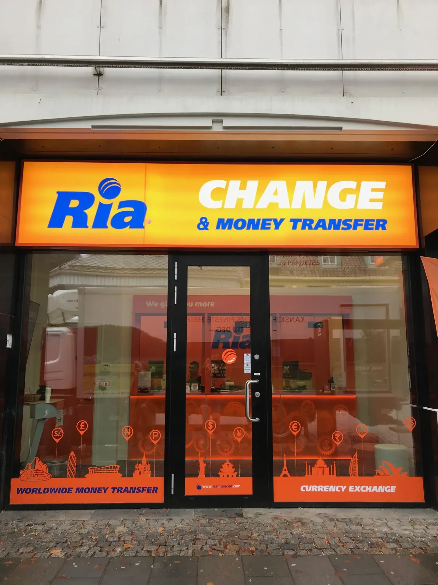 Ria Money Transfer shopfront with a large illuminated fascia sign