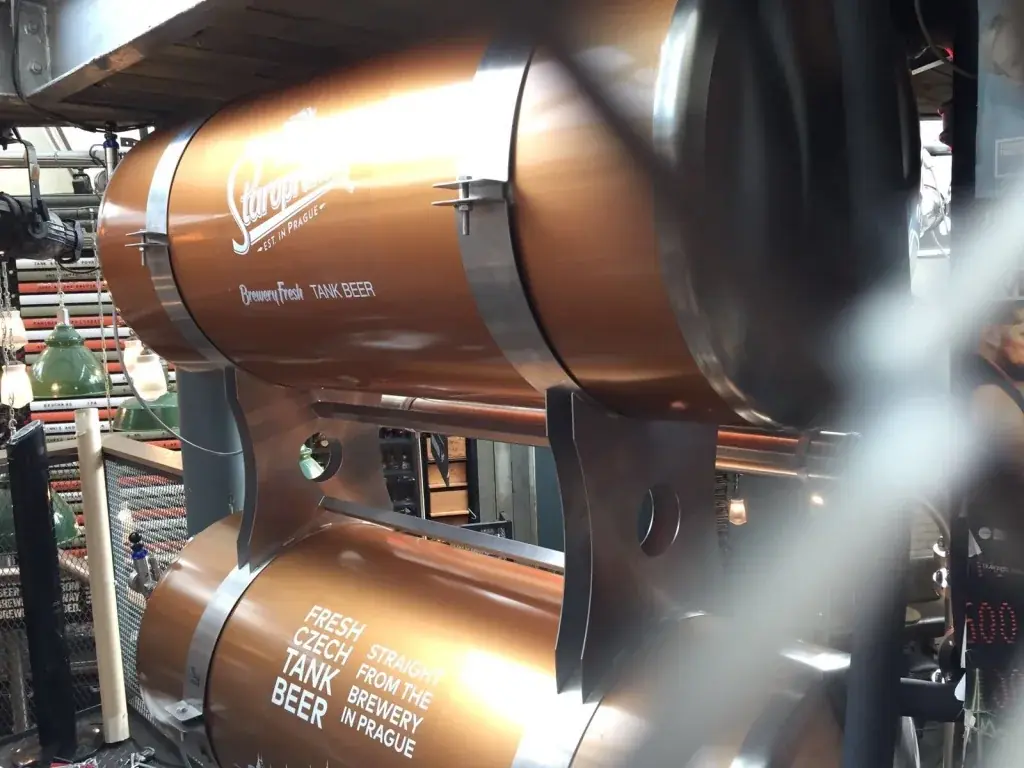Staropramen graphics applied to stacked copper tanks at Indigo Yard, gallery image 30