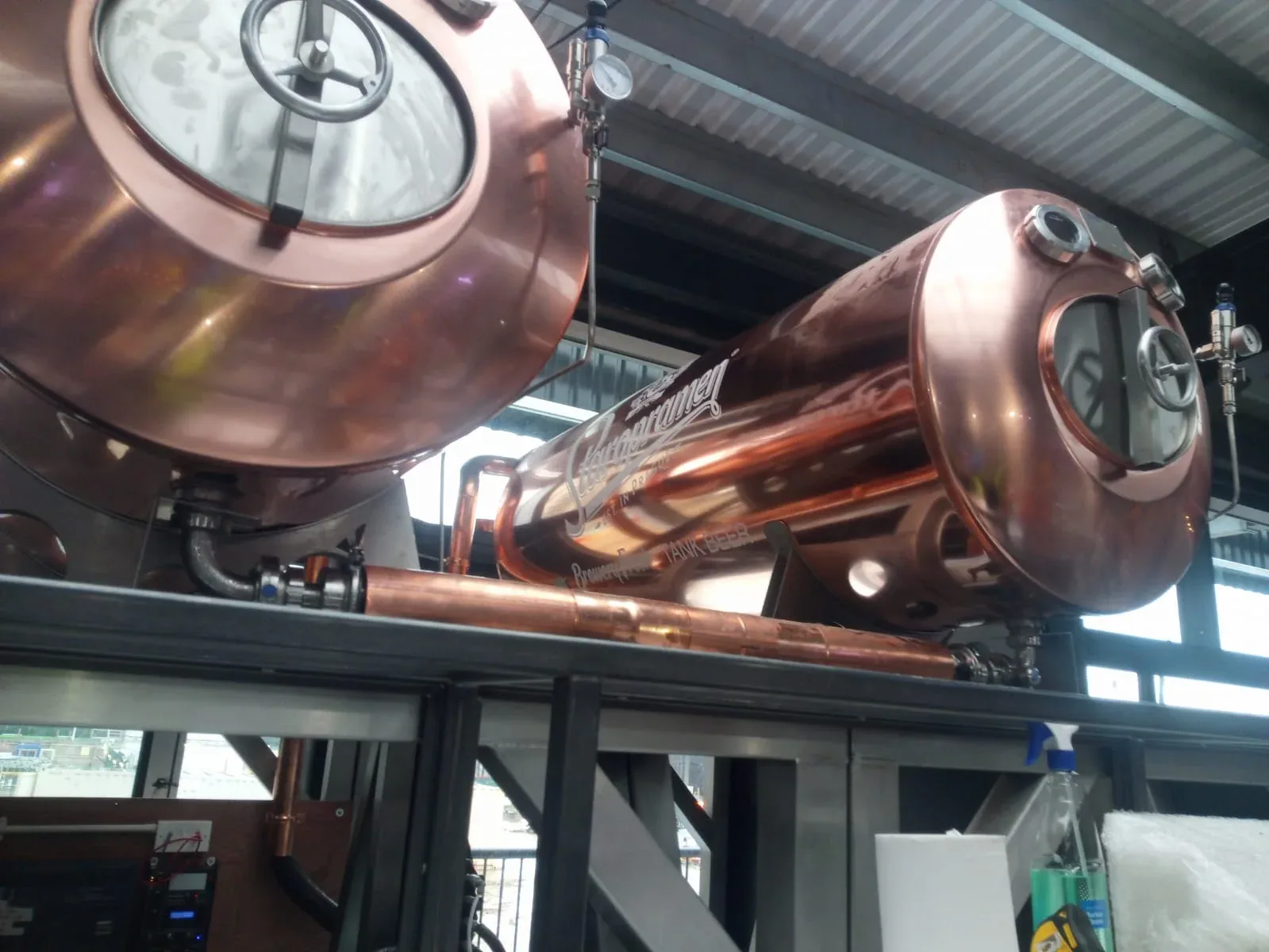 Staropramen vinyl logo applied to a curved copper beer tank, gallery image 3