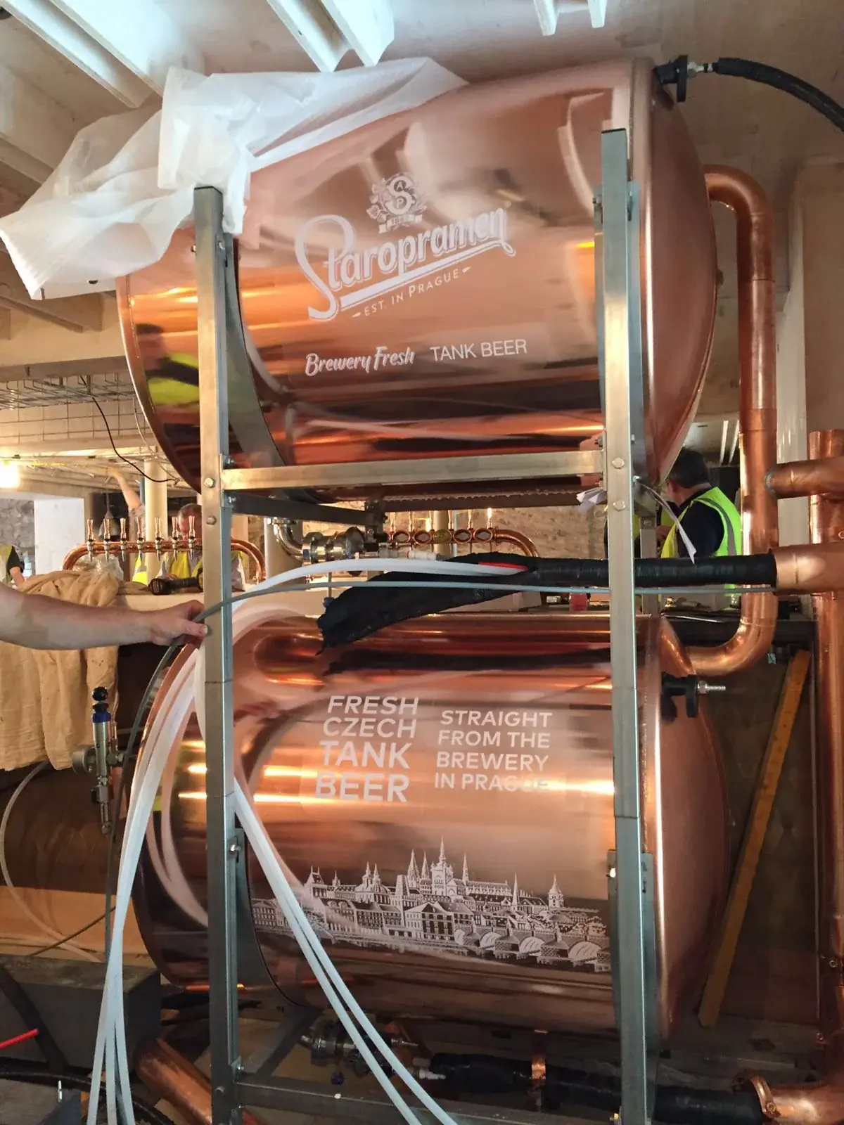 Stacked copper beer tanks with Staropramen vinyl graphics, gallery image 37