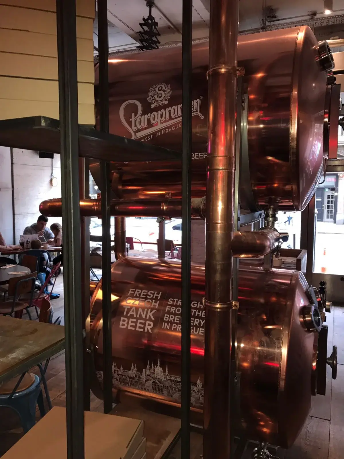 Staropramen tank beer graphics installed in a restaurant interior, gallery image 38