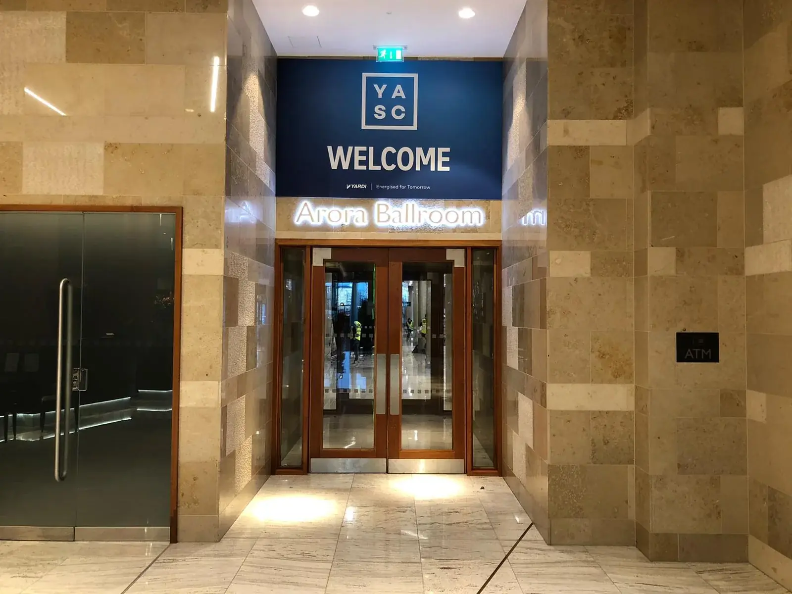 Completed YASC branded lift-door graphics