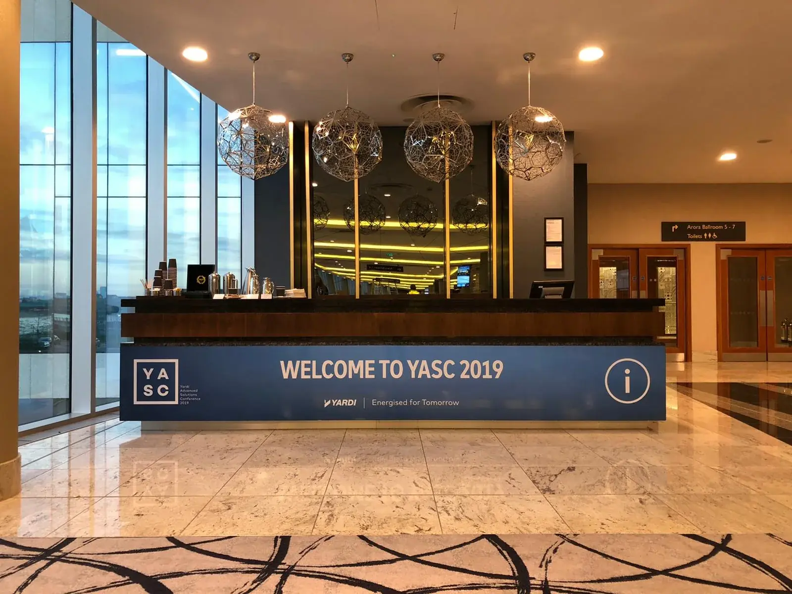 YASC registration area enclosed with blue branded rigid-board graphics