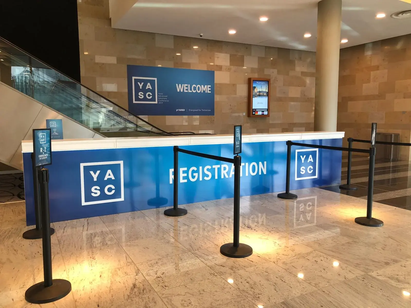 YASC registration desk with coordinated Dibond board graphics