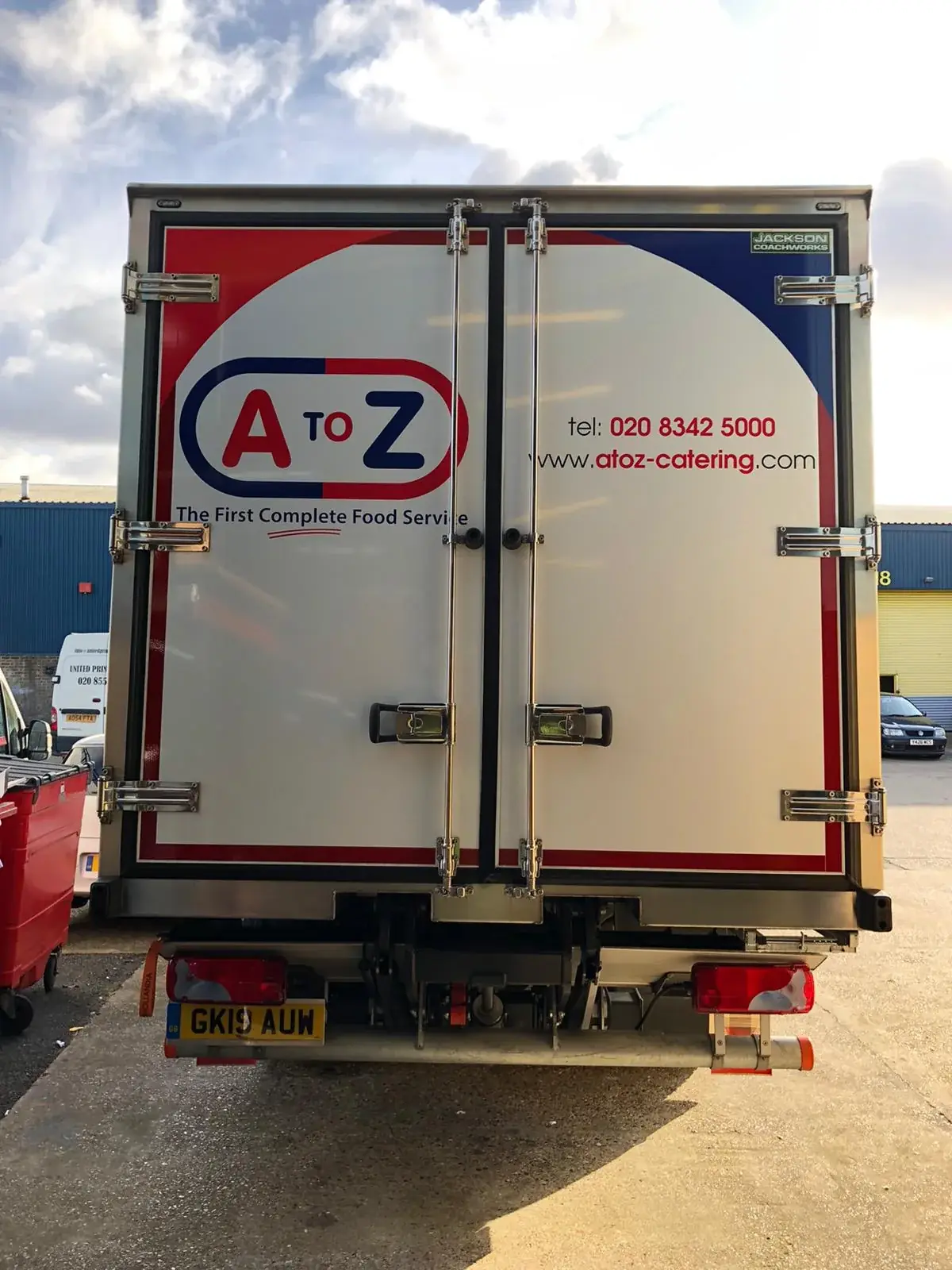 Rear-door food-service graphics on the A to Z catering truck, gallery image 4
