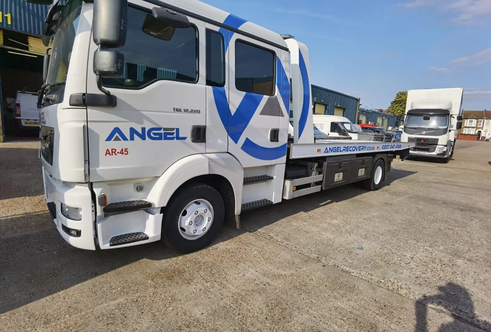 Angel Recovery truck graphics extending across the cab doors and recovery bed — Truck & Lorry Graphics example for Newham