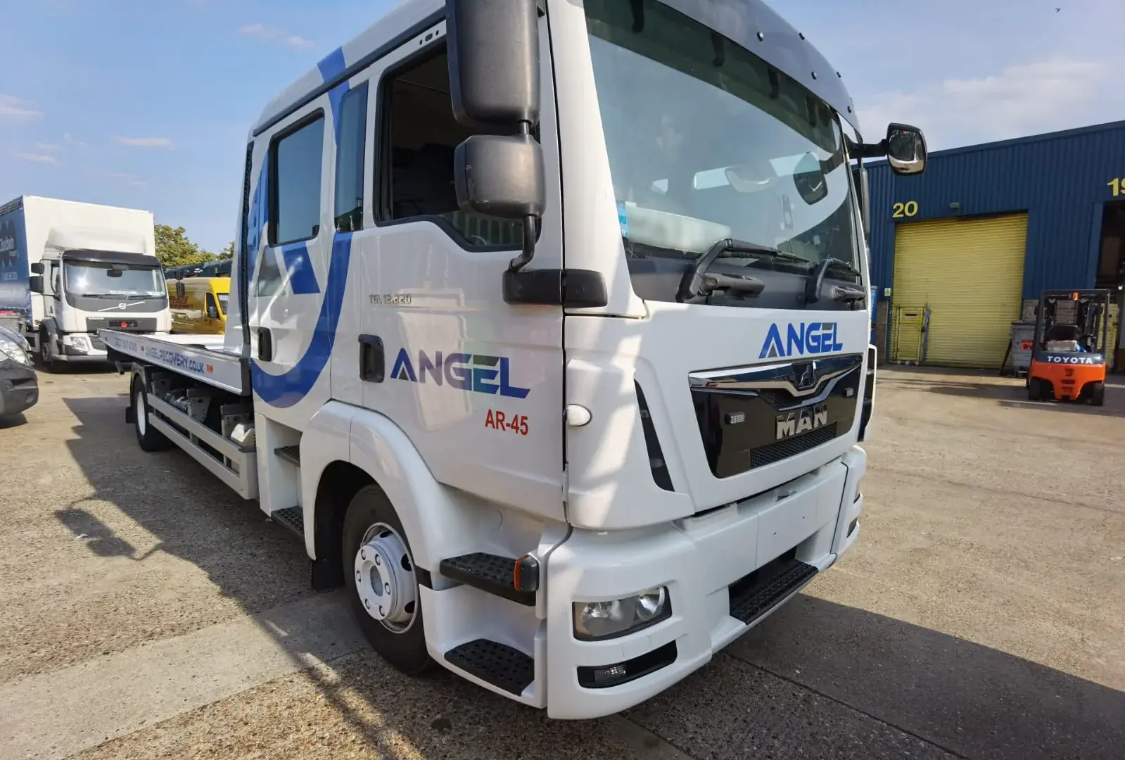 Hampstead NW3 Truck & Lorry Graphics reference image Right front view of Angel Recovery branding across the truck cab — Truck & Lorry Graphics example for Hampstead NW3