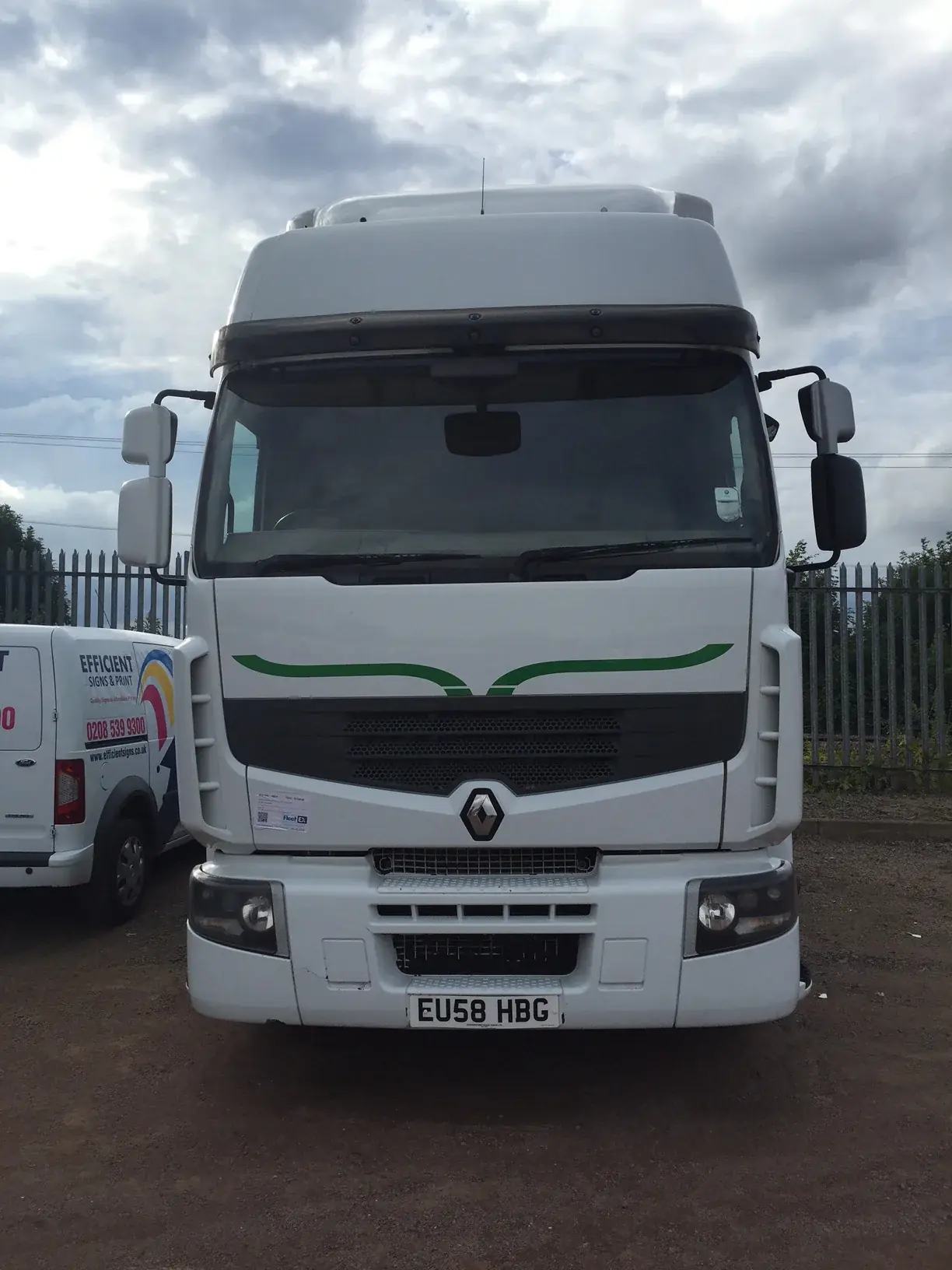 Front view of a BSN truck with coordinated green grille graphics — Truck & Lorry Graphics example for Tower Hamlets