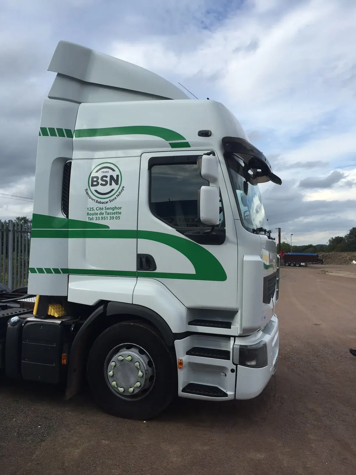 Knightsbridge SW1X/SW7 Truck & Lorry Graphics reference image Right-side view of BSN truck cab branding and green vinyl stripes — Truck & Lorry Graphics example for Knightsbridge SW1X/SW7