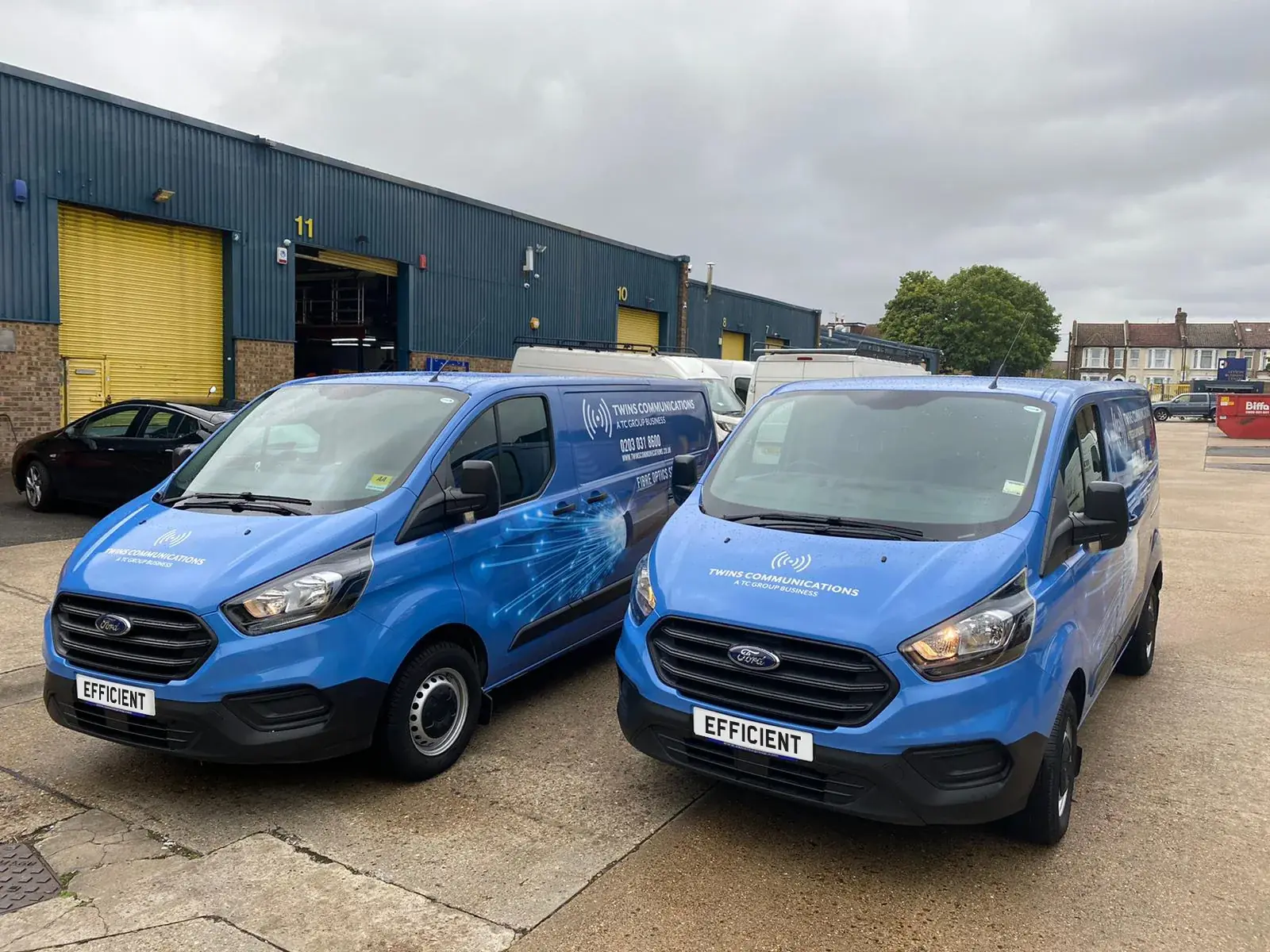 Two Twins Communications fleet vans displaying consistent front and side branding — Fleet Graphics example for Fitzrovia W1T/W1W
