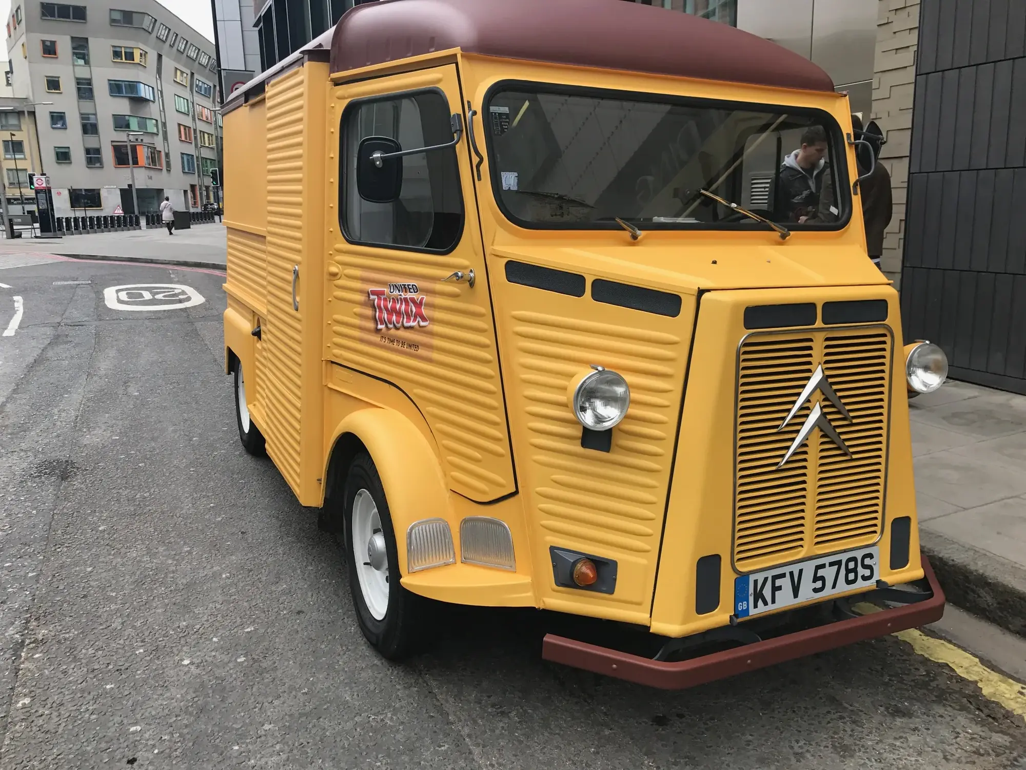 Front-quarter view of a vintage Twix promotional food truck with door branding, gallery image 2