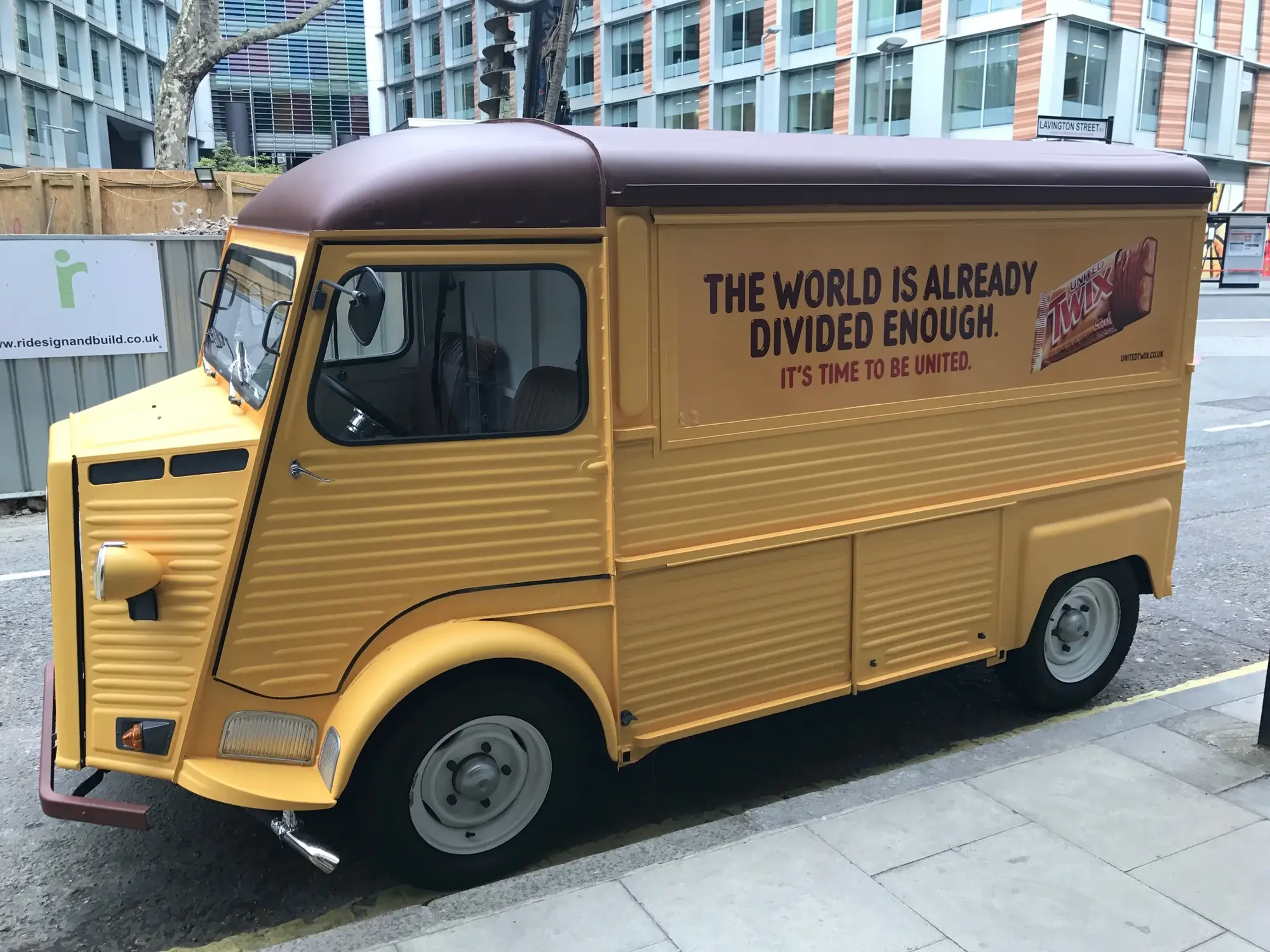 Side view of a vintage Twix promotional food truck with campaign graphics across the body panel, gallery image 1
