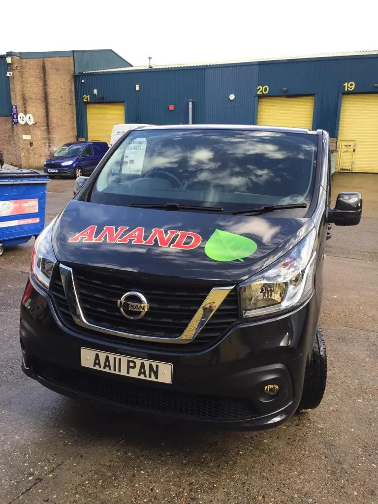 Maharajah Anand van bonnet graphics with red lettering and green leaf symbol — Van Graphics example for Marylebone W1H/W1U