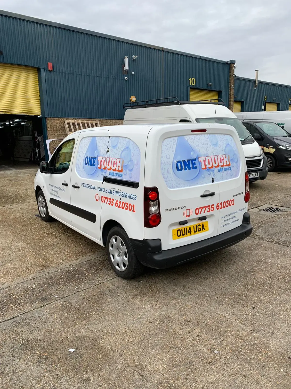 One Touch property maintenance van signs with blue and green branding — Van Graphics example for Aldgate E1