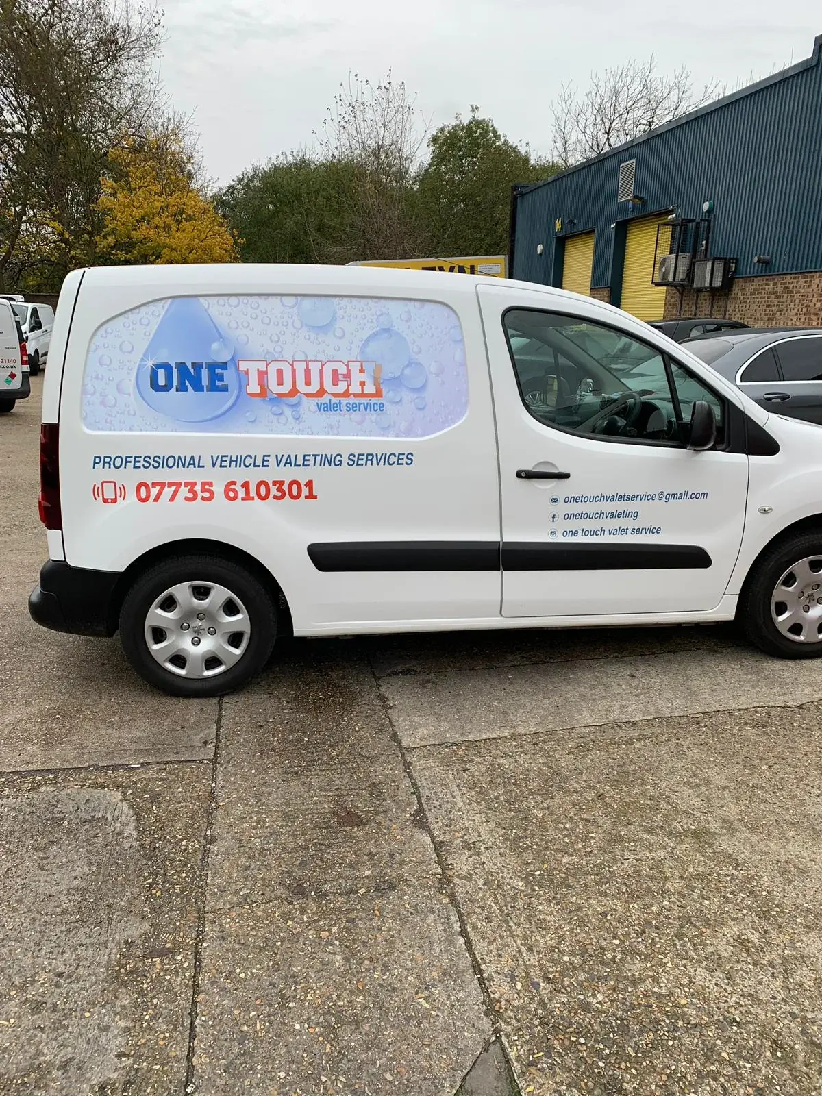 One Touch van graphics shown across the side doors and body panels — Van Graphics example for Spitalfields E1