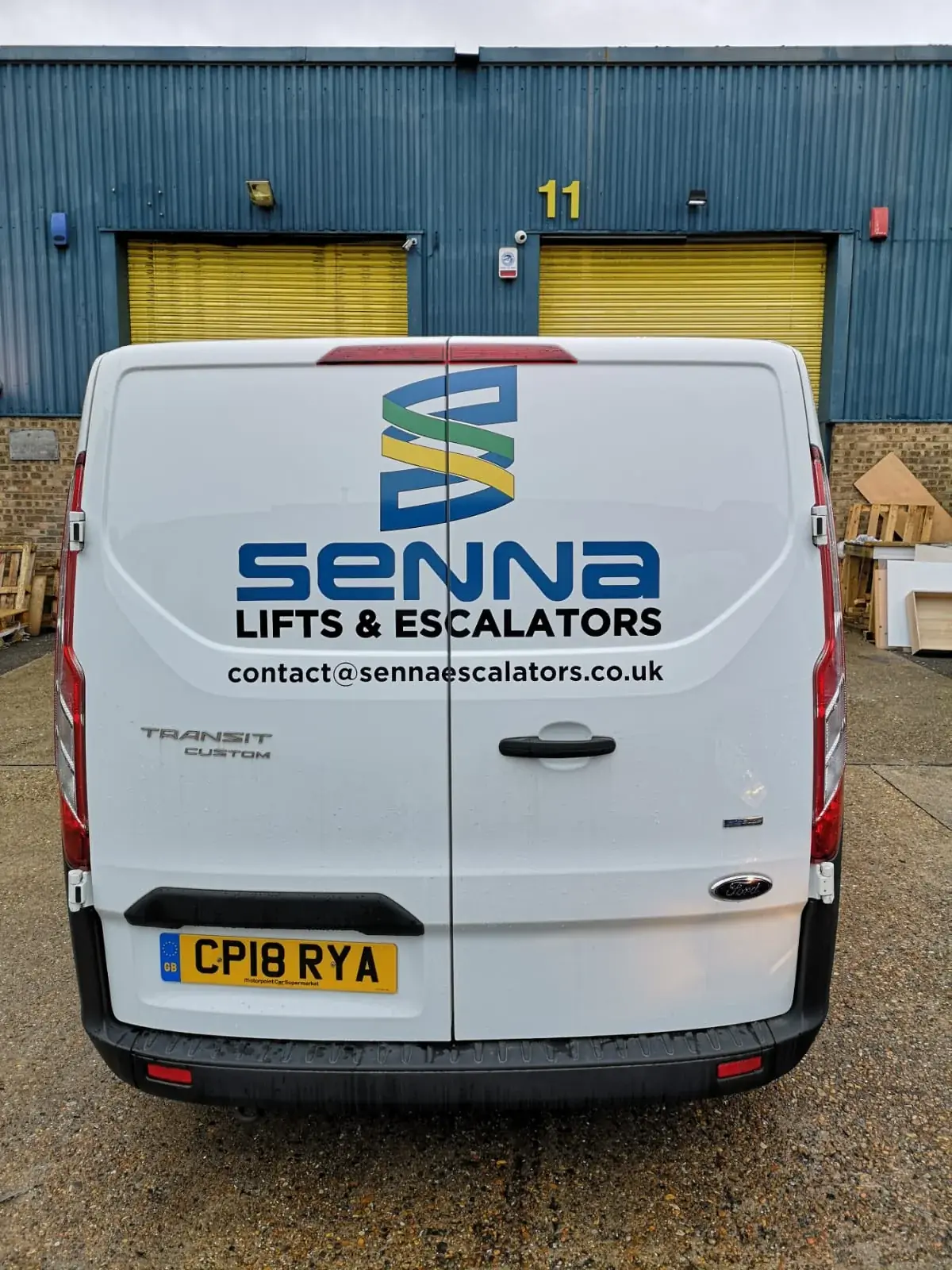 Senna Lift and Escalators van rear graphics with service branding — Van Graphics example for Bow E3