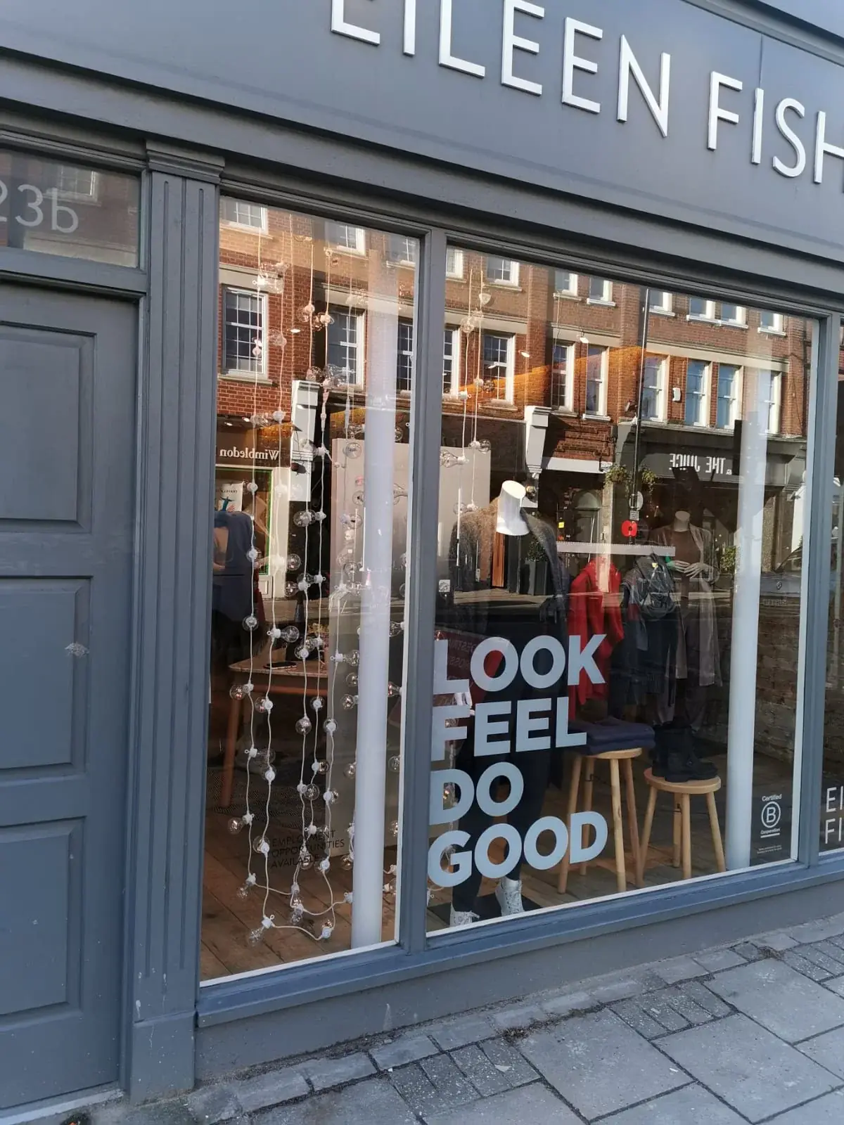 Look and Feel retail window graphics applied as a full-height branded composition