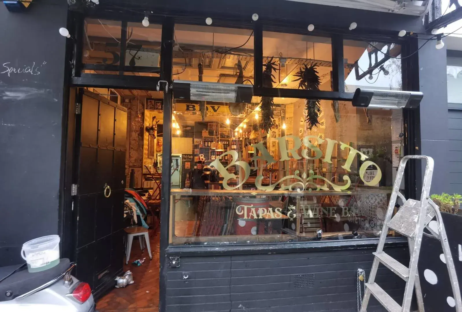 Printed graphics applied to a business window