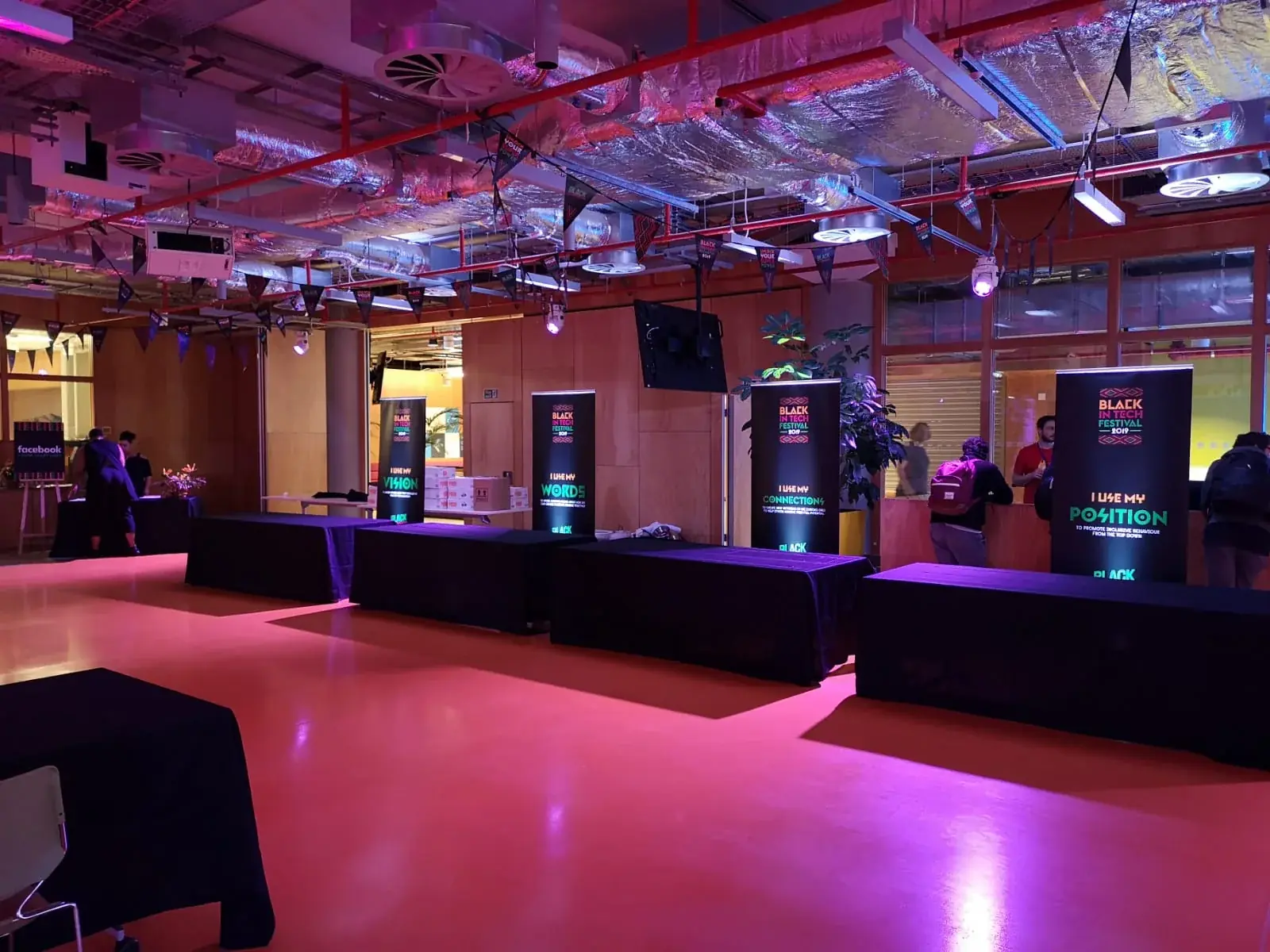 Black in Tech Festival roll-up displays positioned around the event space